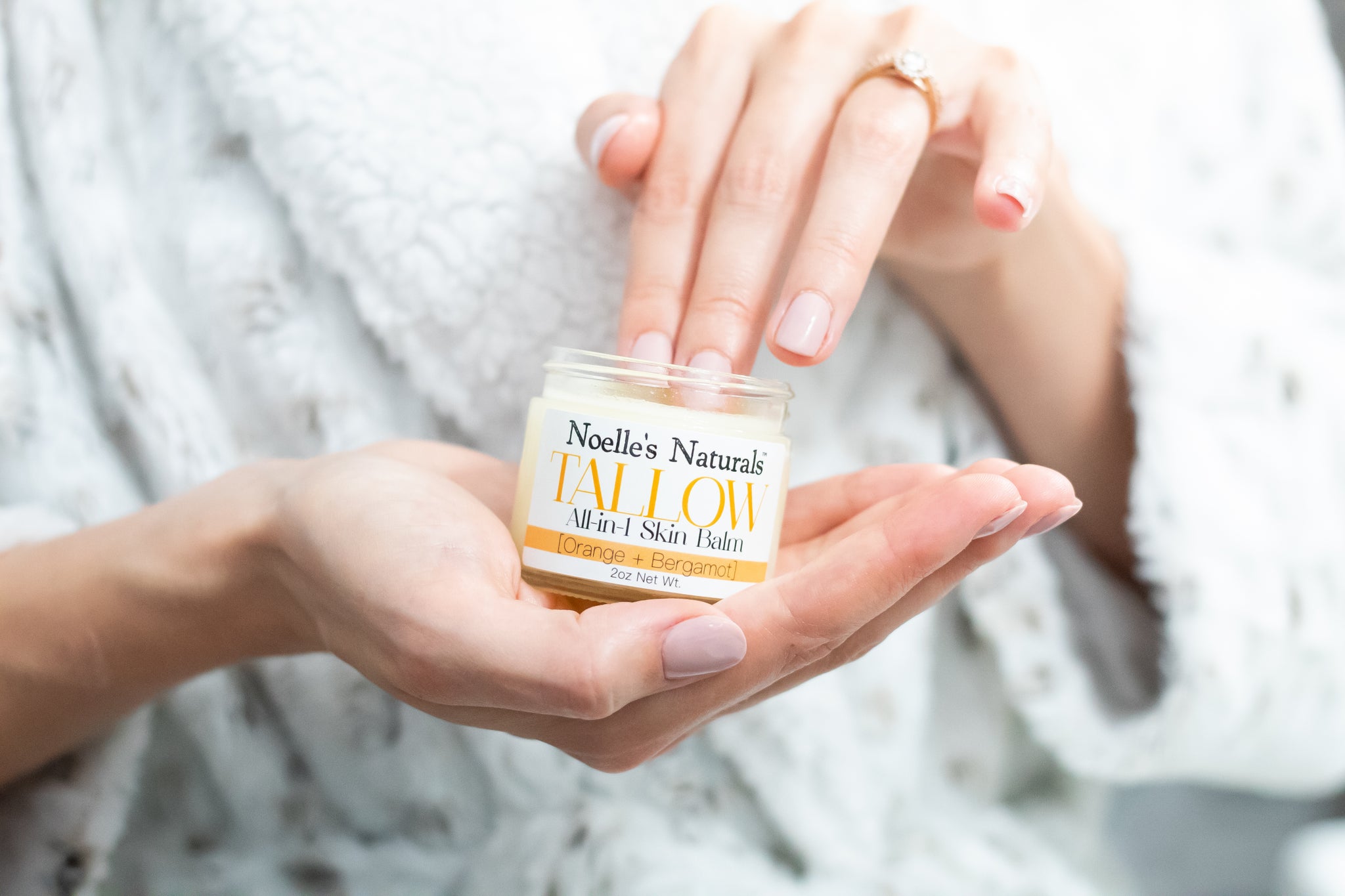 Noelle's Naturals 100% Grassfed Tallow Balm in Orange and Bergamot. Perfect tallow balm for on the go! Will leave your skin nourished and moisturized with all natural, non-toxic ingredients!